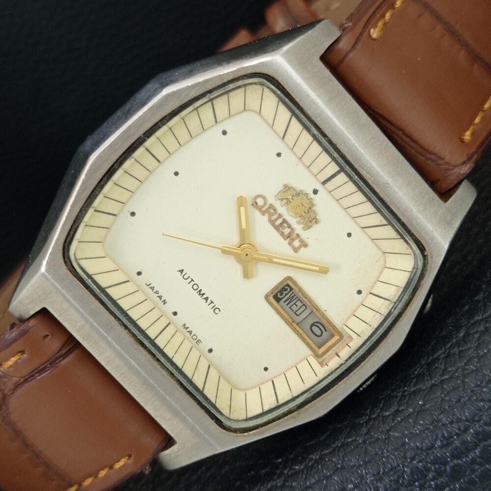 Vintage 1978 Orient Automatic Mens Silver Watch W/daydate & Gold accents